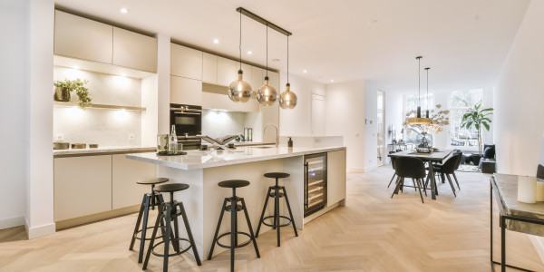Comprar / Vender Apartamentos y Lofts en Barcelona · con Cocinas y Baños de Diseño